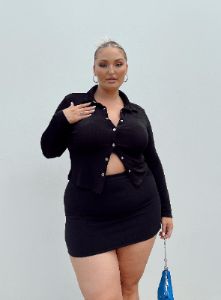 Selby Mini Skirt Black Curve Lower Impact sold by Princess Polly