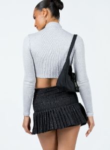The Beau Mini Skirt Black sold by Princess Polly