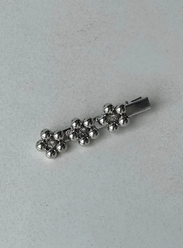 Melia Flower Hair Clip Chrome sold by Princess Polly