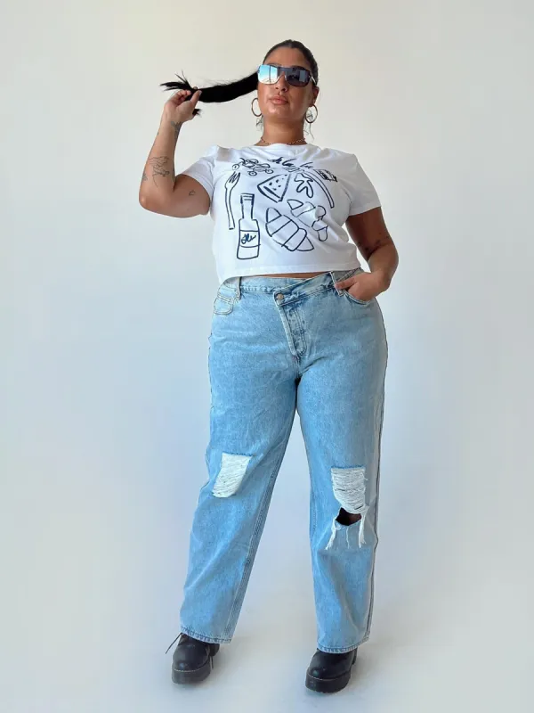 Holly Asymmetric Ripped Leg Jeans Curve sold by Princess Polly