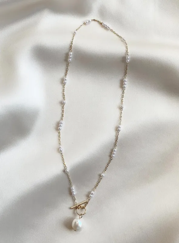 Lenna Necklace Gold / Pearl sold by Princess Polly