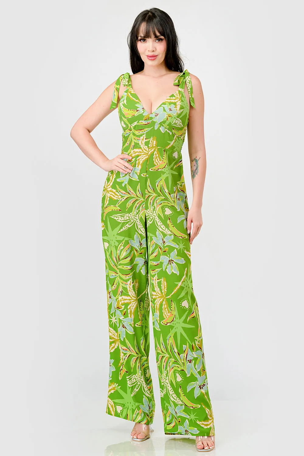 TROPICAL FLORAL SMOCKED BOW TIE STRAPS JUMPSUIT sold by privy