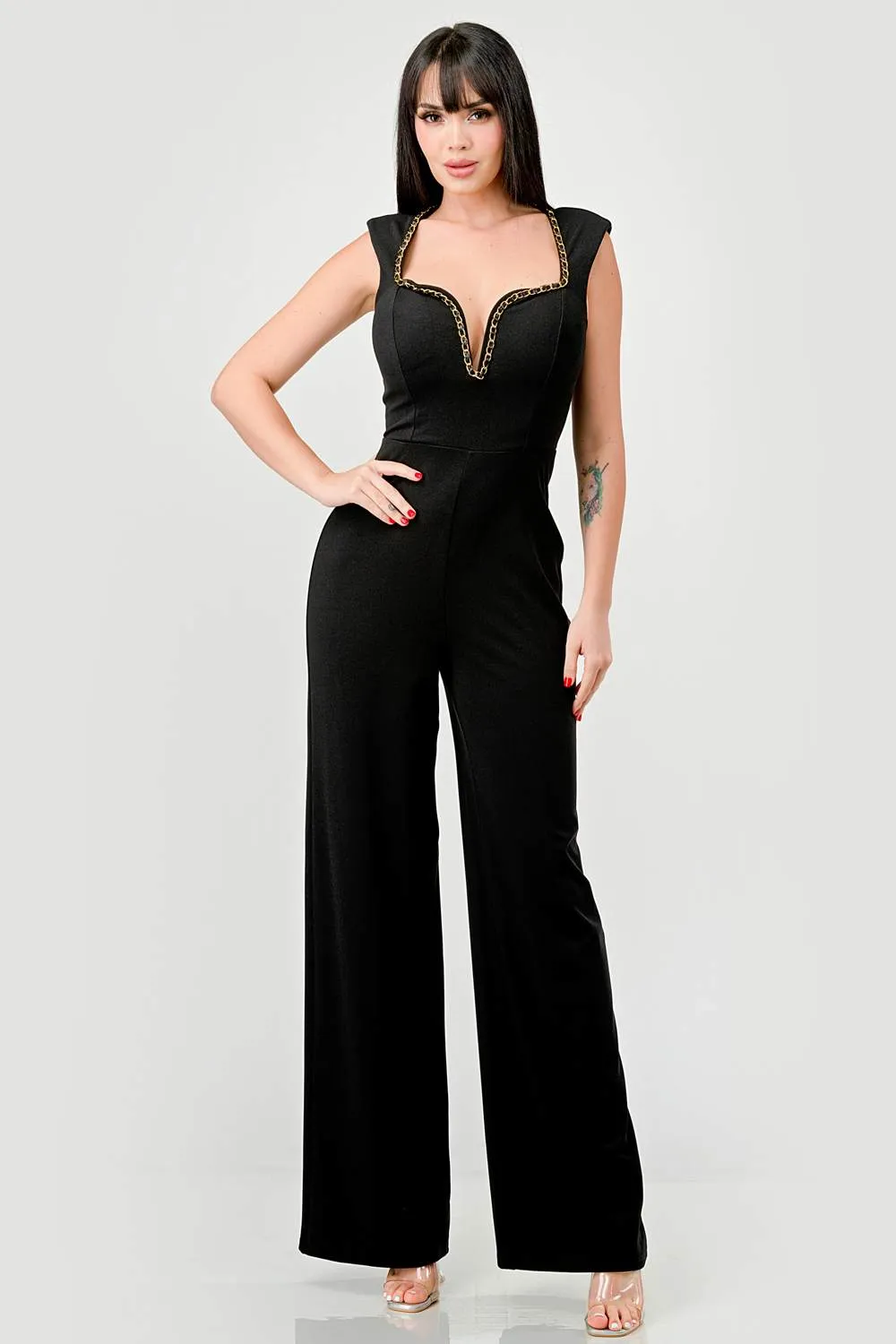TECHNO CREPE GOLD CHAIN TRIM DETAIL JUMPSUIT sold by privy