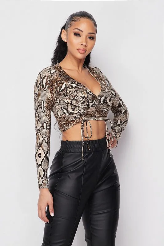 SNAKE PRINT DEEP-V FRONT SHIRRING CROPPED TOP sold by privy