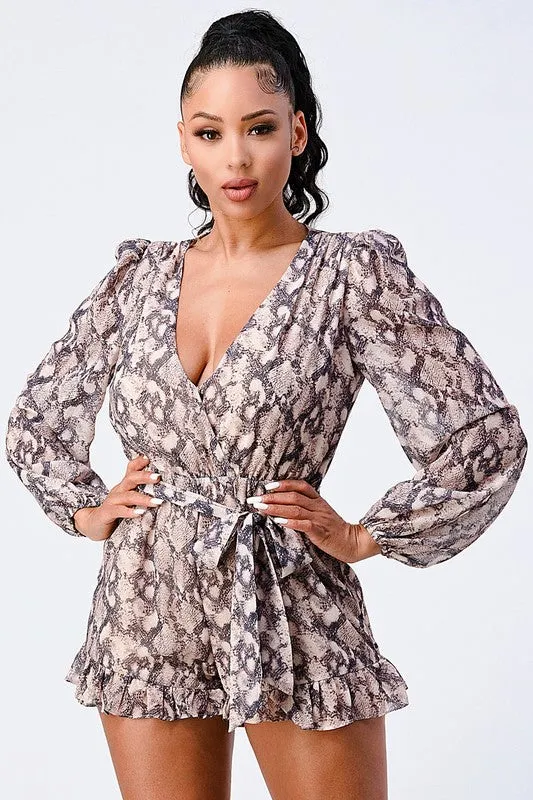 PRINTED WAIST TIE SURPLICE LONG SLEEVE ROMPER sold by privy