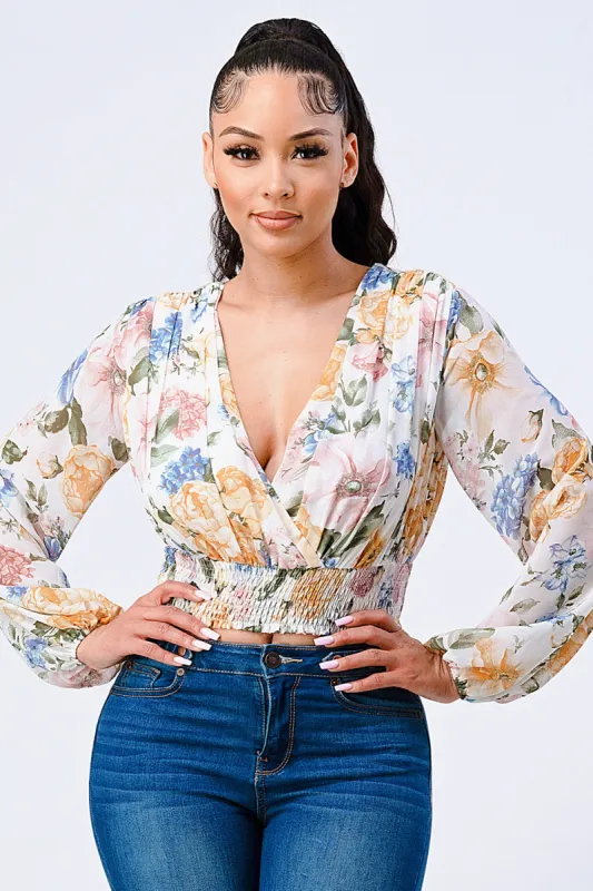 FLORAL CHIFFON SMOCKED V-NECK WRAP TOP sold by privy