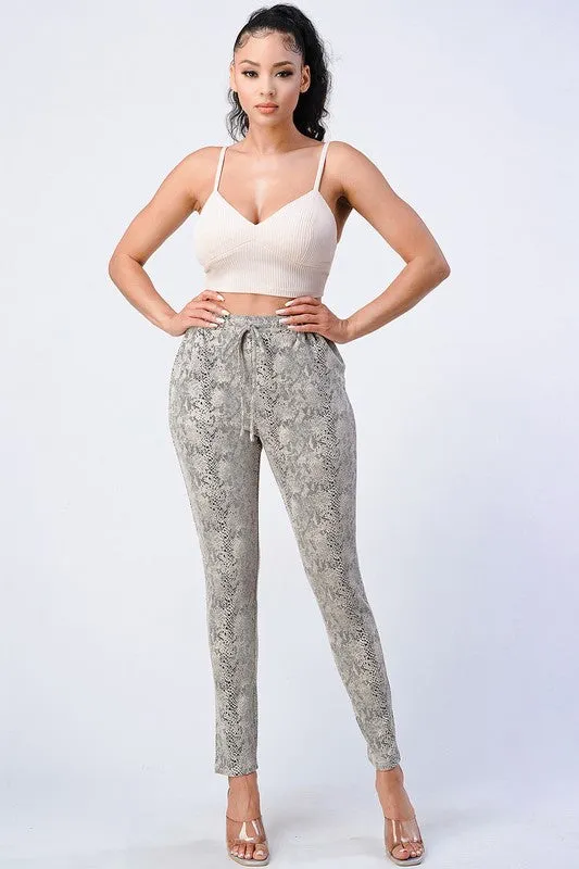 SNAKE PRINT DRAWSTRING WAIST CROPPED PANTS sold by privy