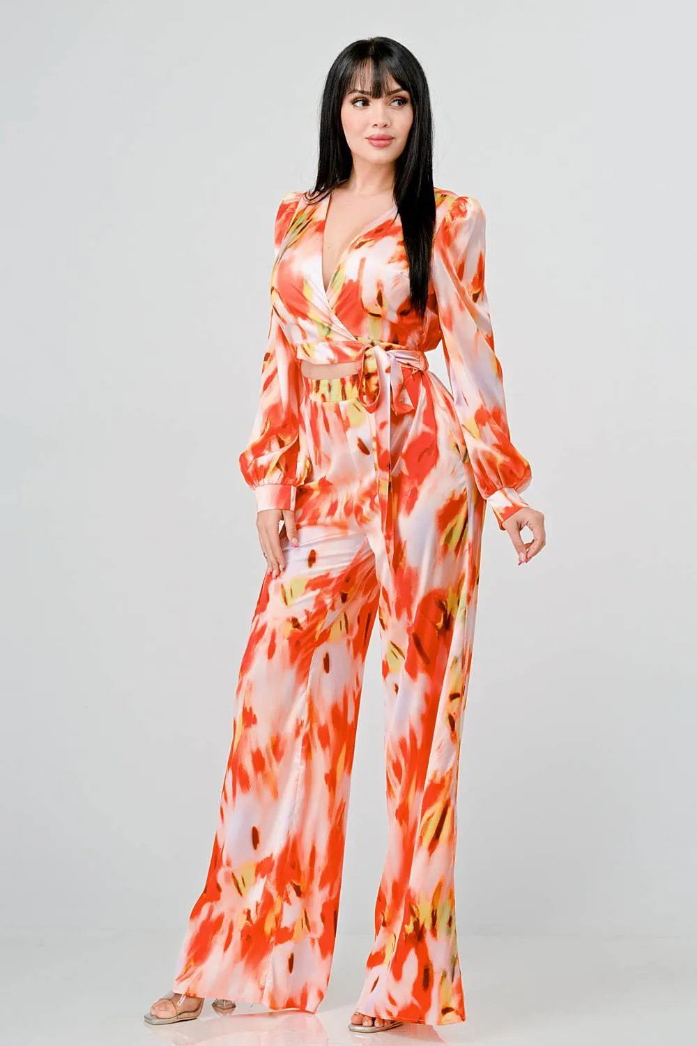 SATIN ABSTRACT PRINTED V NECK LONG SLEEVE JUMPSUIT sold by privy