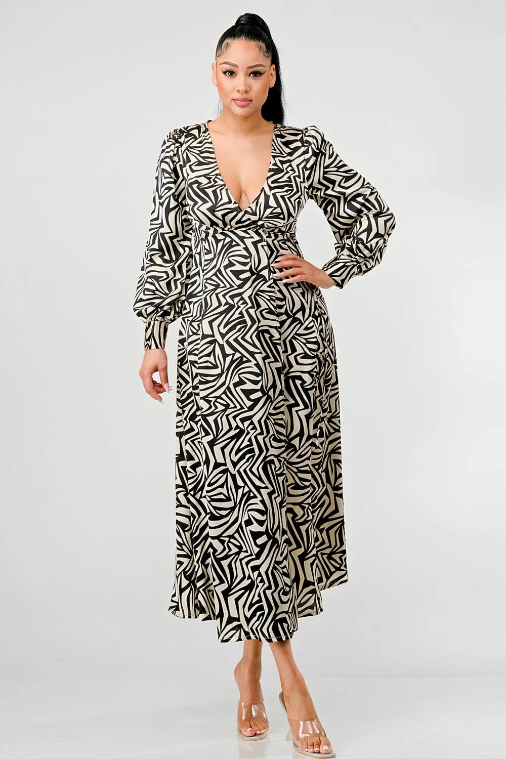ABSTRACT PRINT DEEP V-NECK SLITTED MAXI DRESS sold by privy