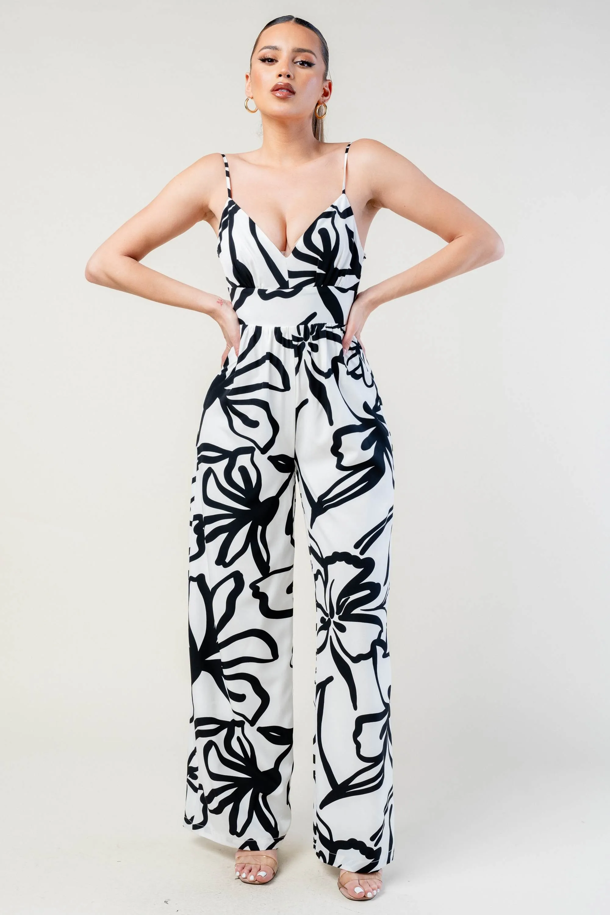 PJ11212E-W / CHIC ABSTRACT PRINT SLEEVELESS RELAX FIT JUMPSUIT sold by privy