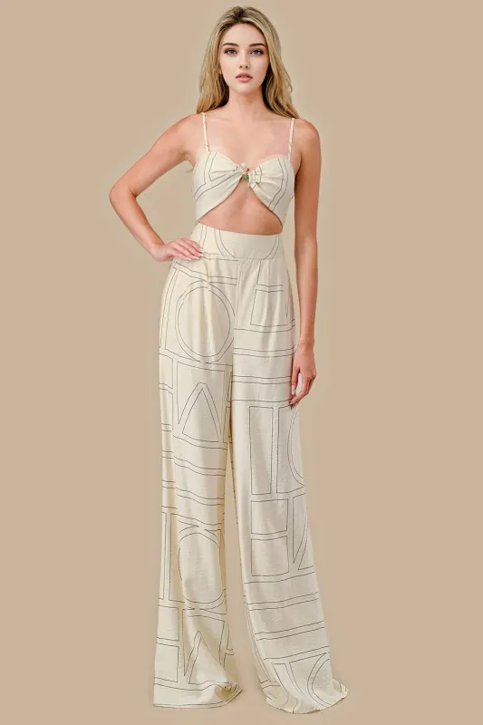 AJWF1147E / WOVEN PRINT W/ HARDWARE TRIM JUMPSUIT sold by privy