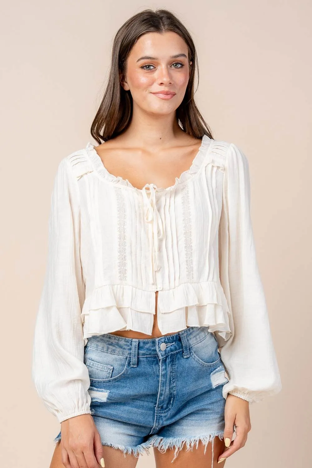 CT10573S / LACE TRIMMED RUFFLE BUTTON FRONT L/S BLOUSE sold by privy