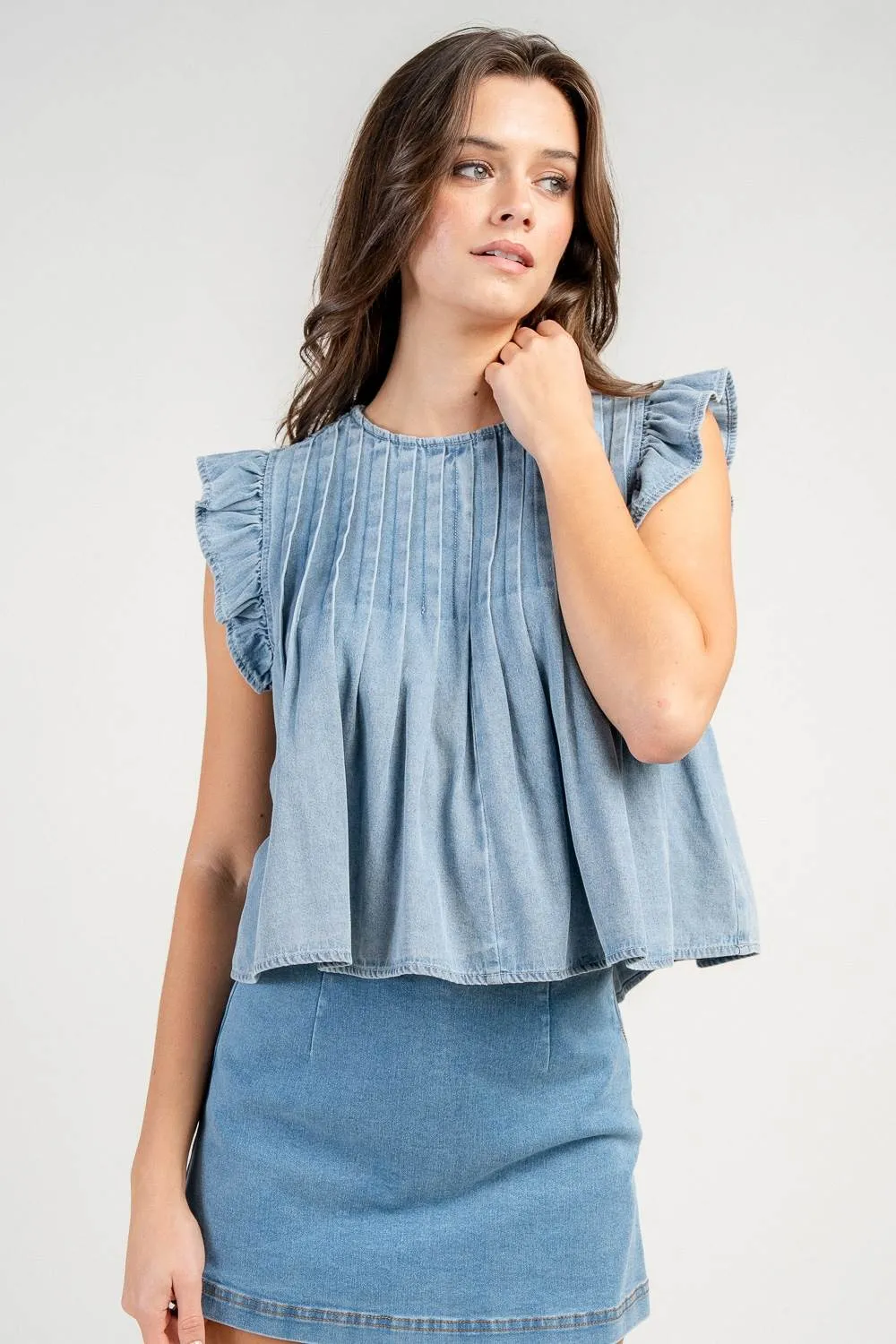 CT10670Y / WASHED DENIM RUFFLE SLEEVE PLEATED DENIM SWING TOP sold by privy