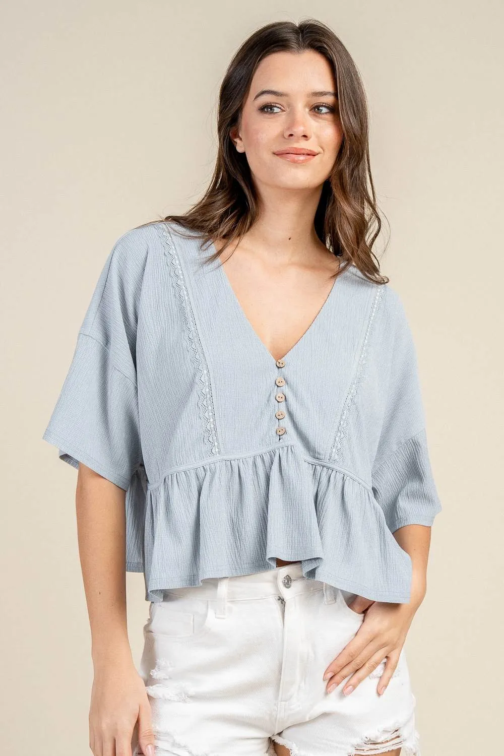 BT3411S / V-NECK BUTTON FRONT PEPLUM BLOUSE sold by privy
