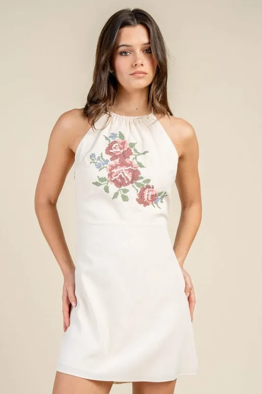BD13372B / EMBROIDERED HALTER NECK OPEN BACK MINI DRESS sold by privy