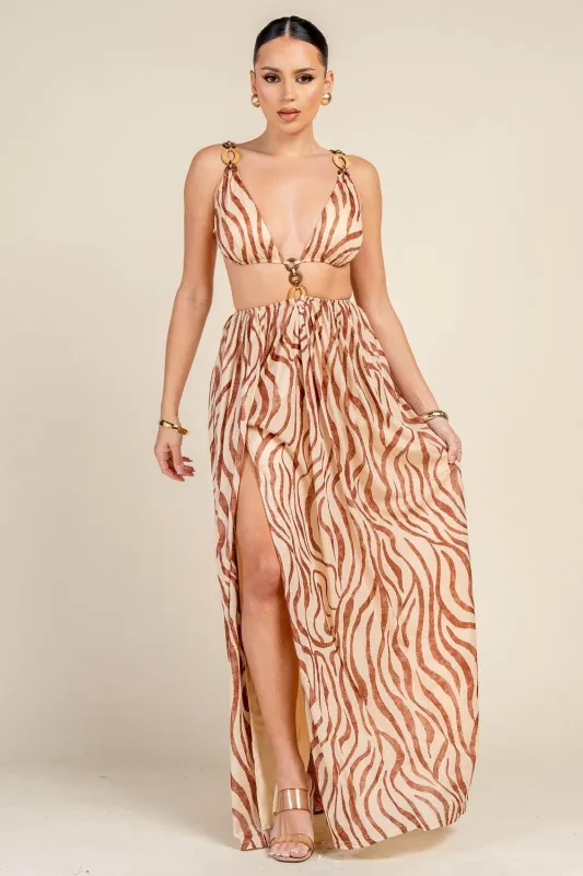 PD79516S / RING DETAIL PRINTED CUT-OUT MAXI DRESS sold by privy