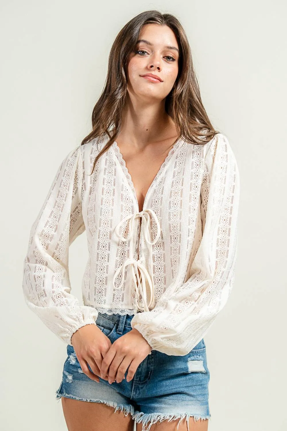 CT10616K / NOVELTY LOOKING TEXTURED L/S KNIT TOP W. FRONT TIES sold by privy product image thumbnail 4