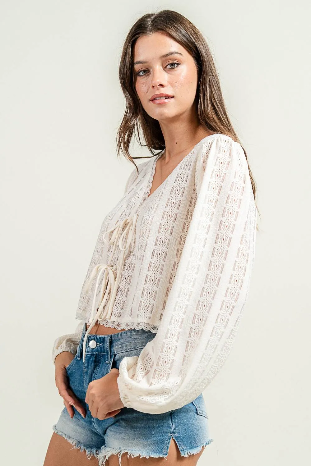 CT10616K / NOVELTY LOOKING TEXTURED L/S KNIT TOP W. FRONT TIES sold by privy product image thumbnail 2
