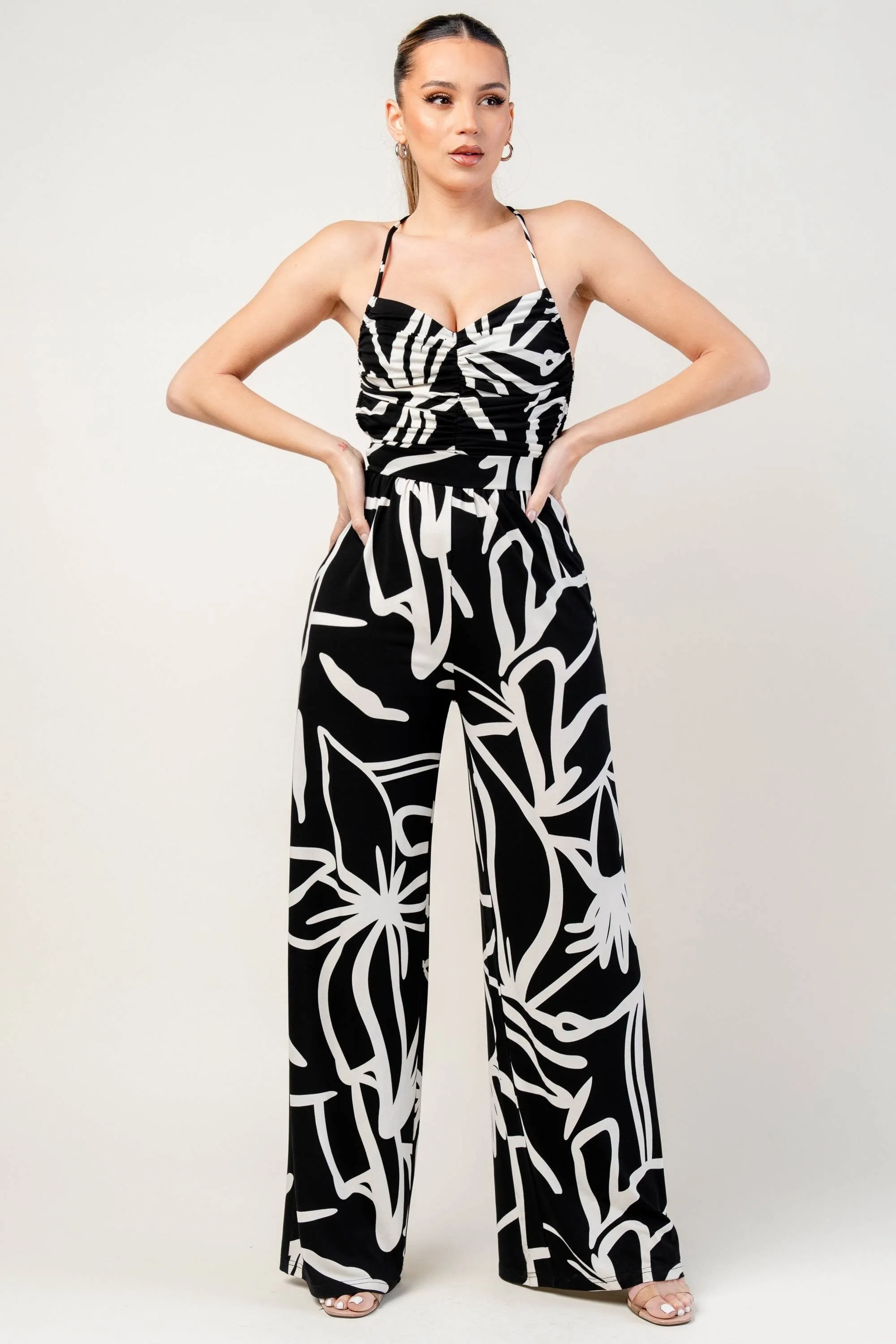 PJ11233B / ABSTRACT PRINT RUCHED BUST SPAGHETTI STRAP WIDE LEG JUMPSUIT sold by privy product image thumbnail 4