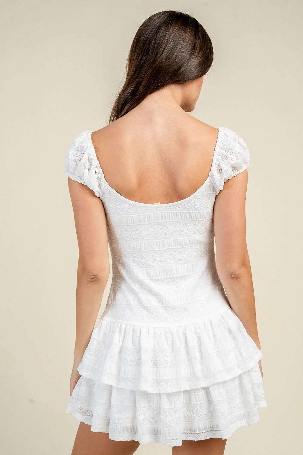 CD30990S / TEXTURED TIE FRONT RUFFLED MINI DRESS sold by privy product image thumbnail 3