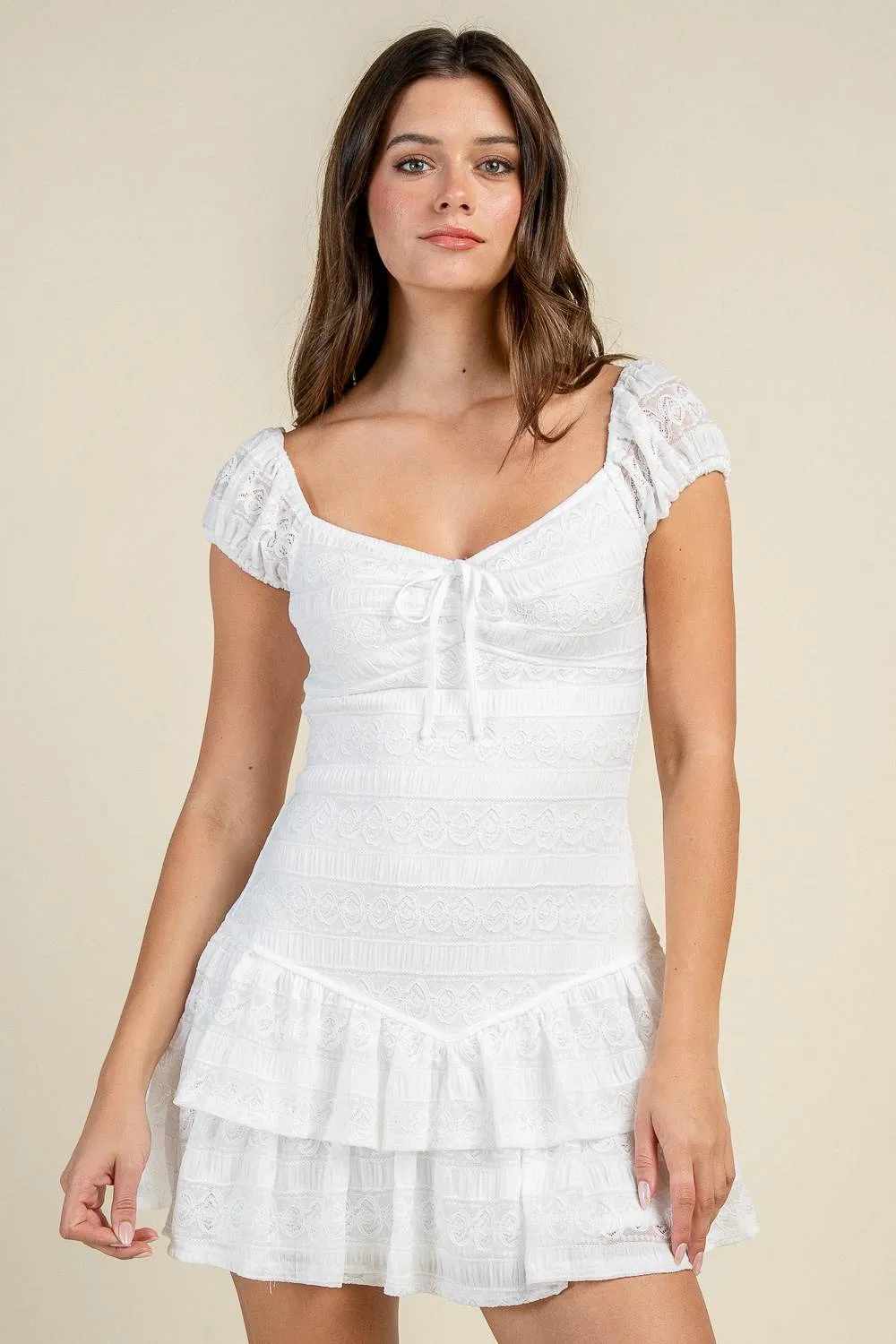 CD30990S / TEXTURED TIE FRONT RUFFLED MINI DRESS sold by privy