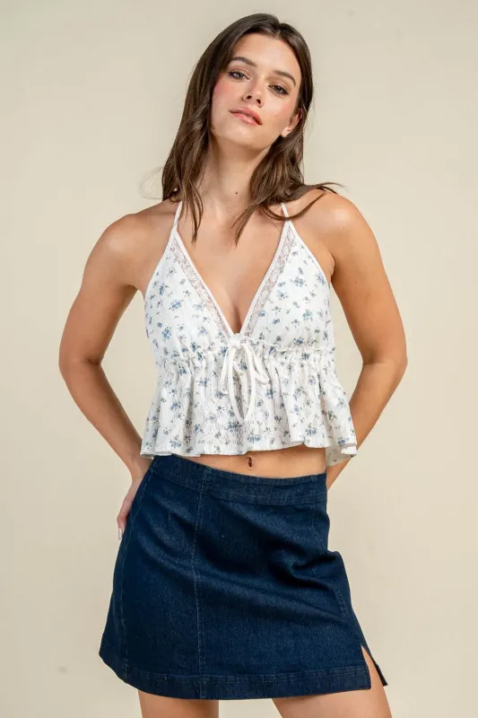 BT3629S / FLORAL PRINT TIE FRONT PEPLUM TOP made by privy