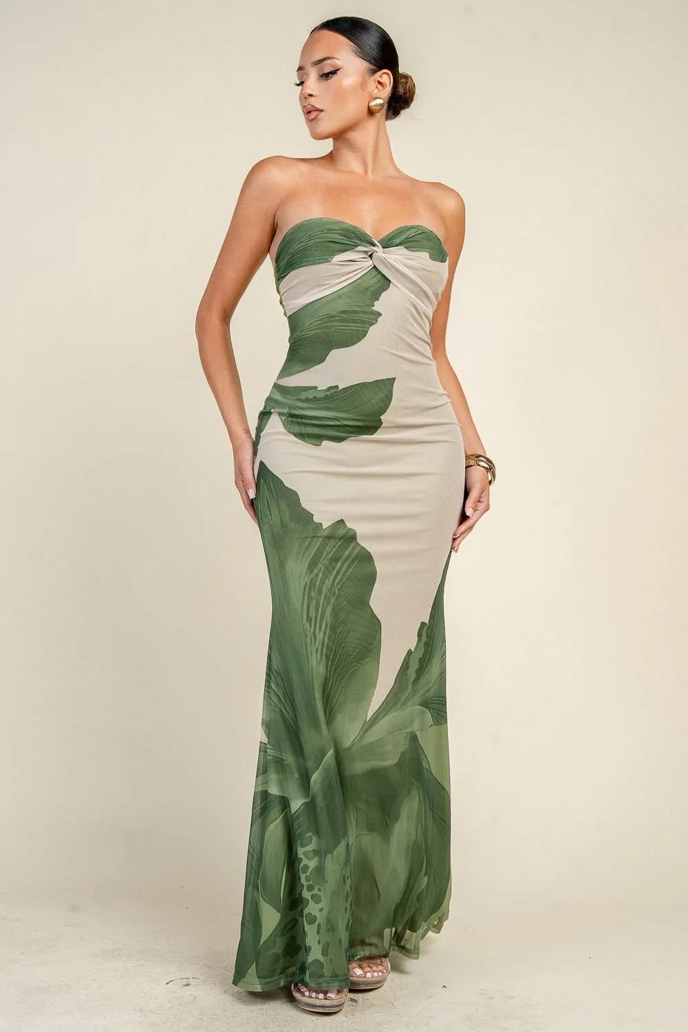 YD30279B / STRAPLESS TWIST FRONT PRINTED MESH MAXI DRESS sold by privy