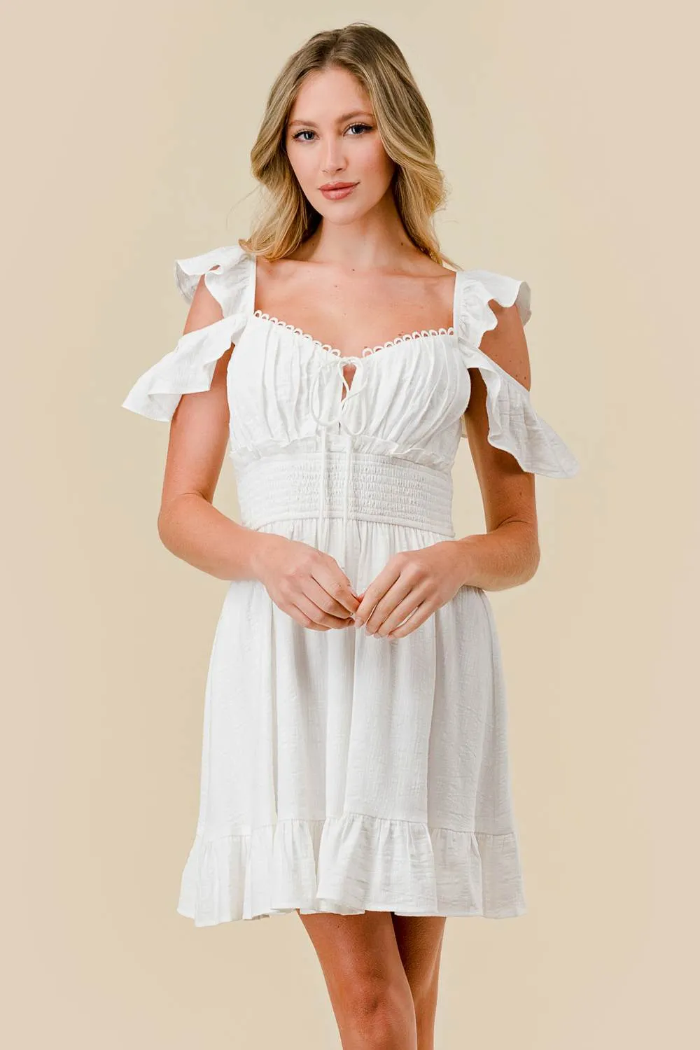 BD12086E / TEXTURED GAUZE RUFFLED SMOCKED BACK MINI DRESS sold by privy product image thumbnail 3