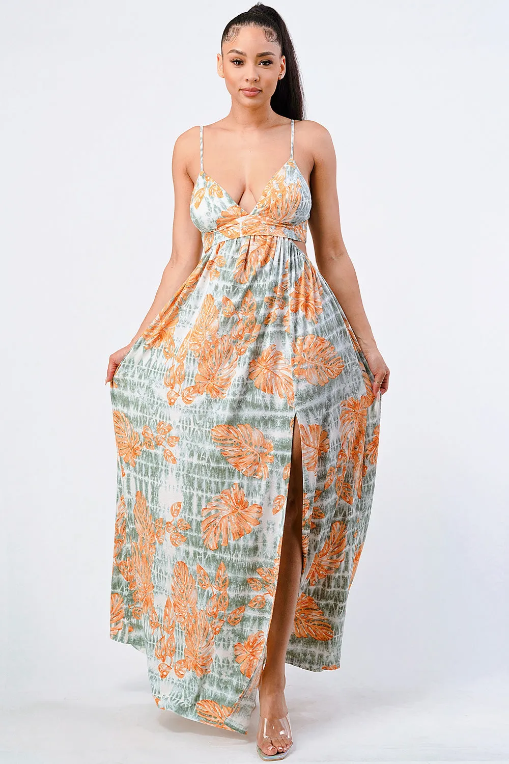 FLORAL PRINT SIDE CUTOUT SLITTED MAXI DRESS sold by privy