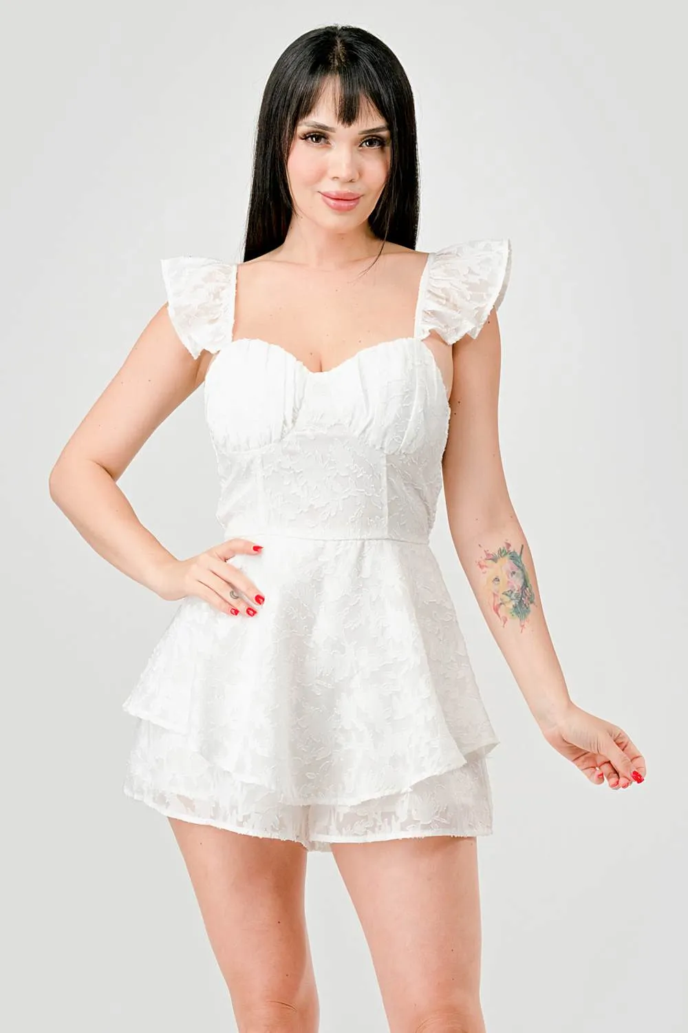 PJ11052E-W / LUXE TEXTURED SMOCKED RUFFLED FLUTTER ROMPER sold by privy