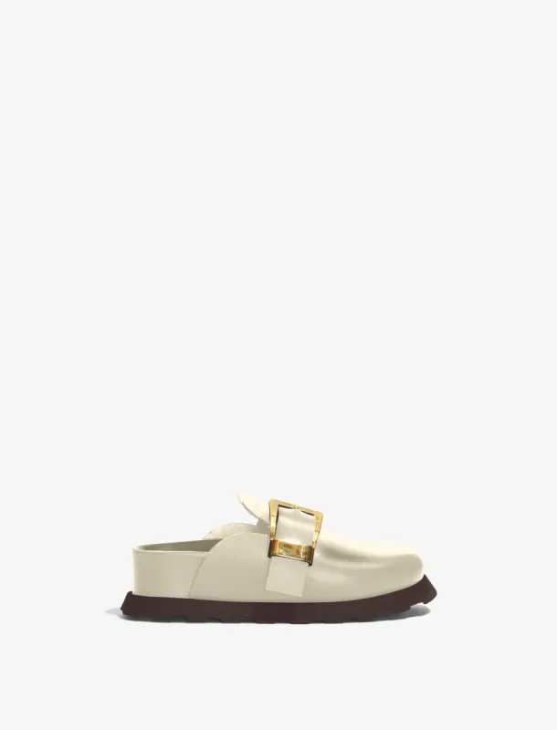 Buckle Mules sold by Proenza Schouler