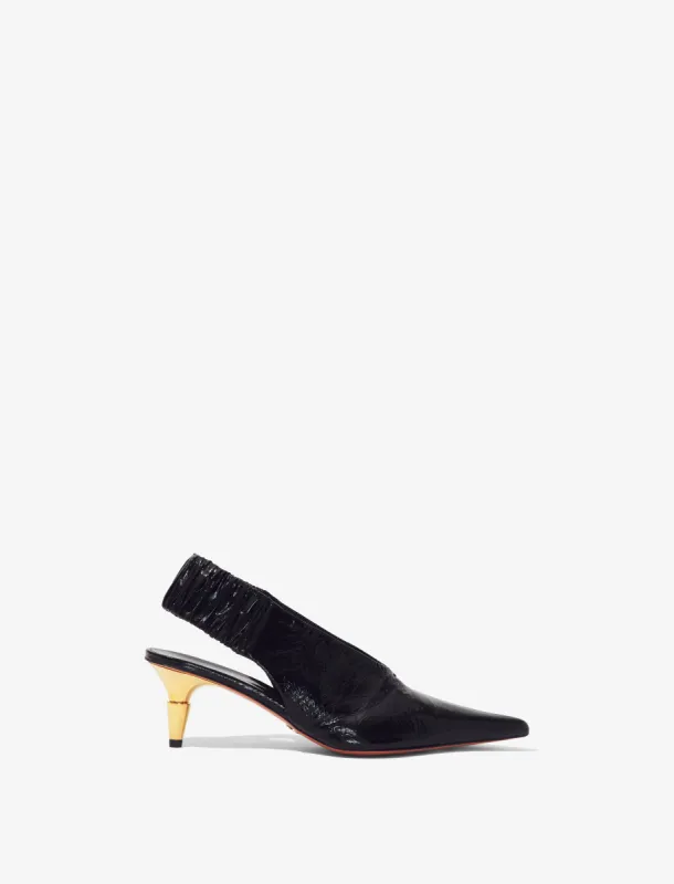 SPIKE SLINGBACK PUMPS - BLACK sold by Proenza Schouler