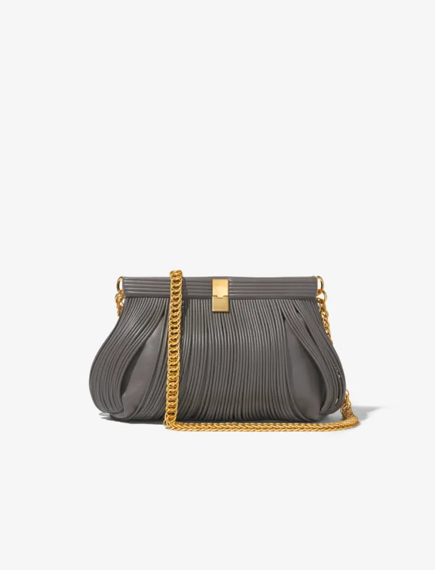 Rolo Frame Clutch sold by Proenza Schouler