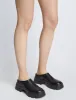 Stomp Mules sold by Proenza Schouler
