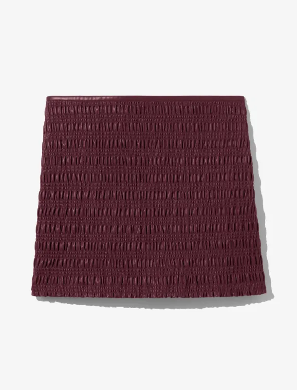 Faux Leather Smocked Mini Skirt made by Proenza Schouler