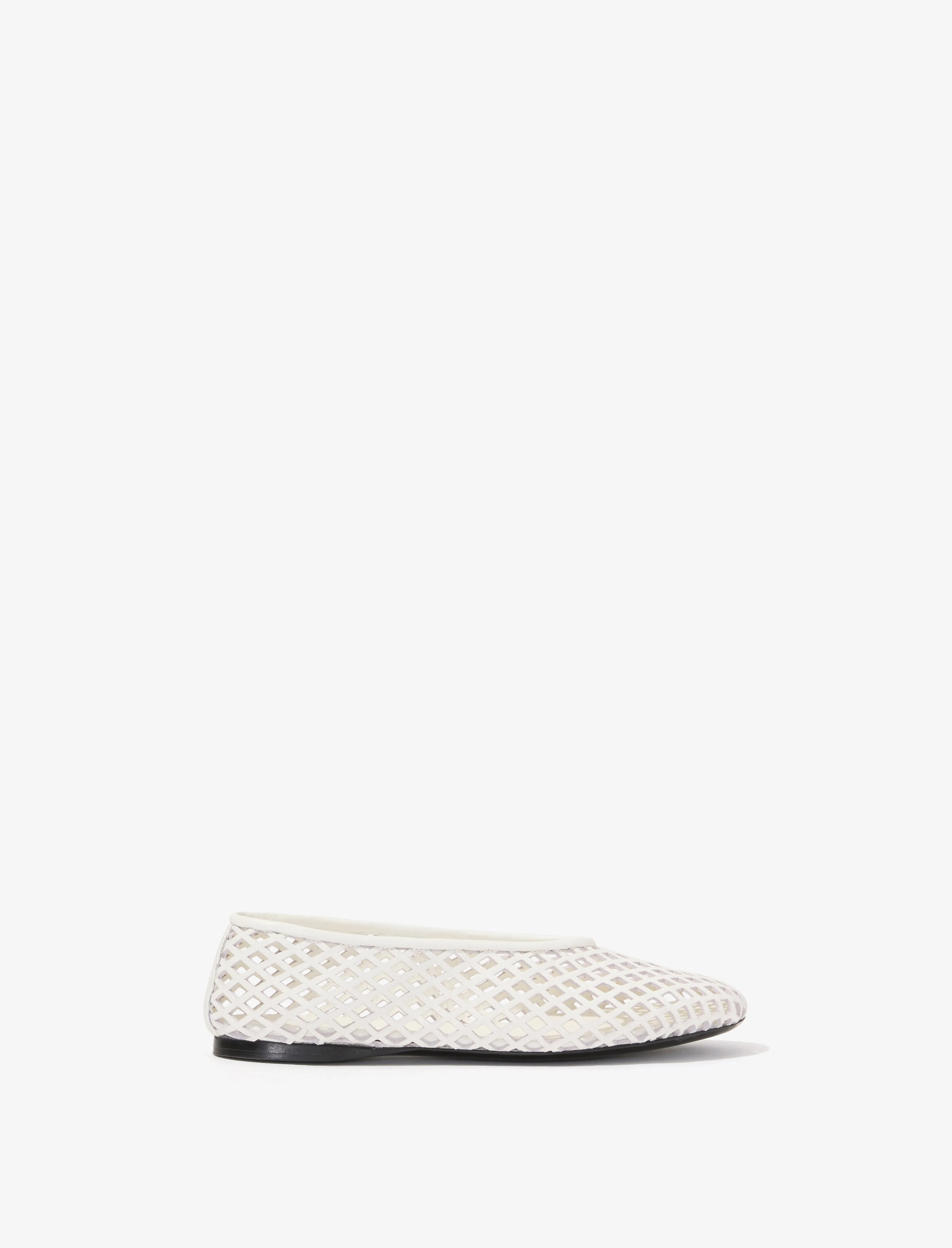 Tee Perforated Ballet Flats sold by Proenza Schouler