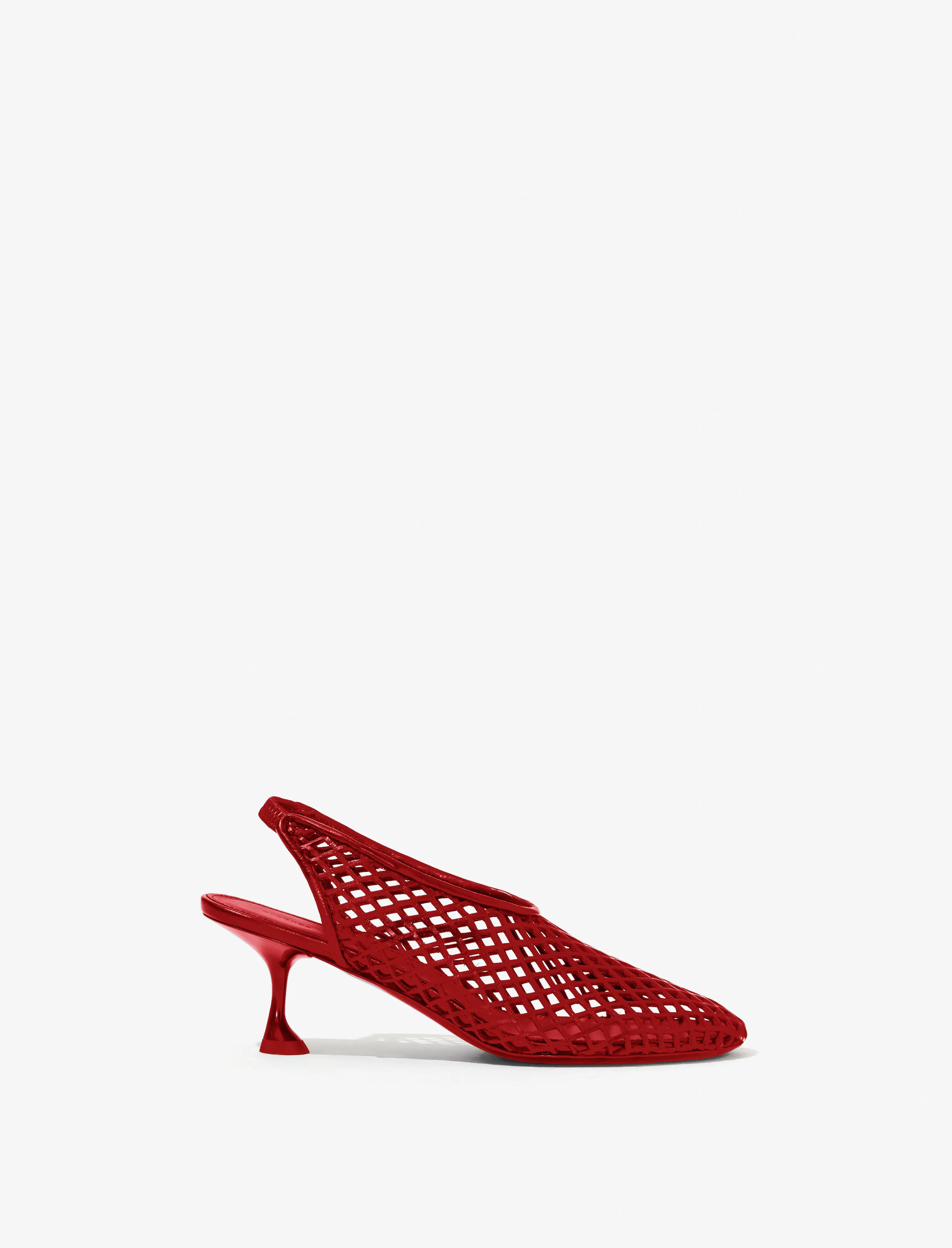 Tee Perforated Slingback Pumps sold by Proenza Schouler