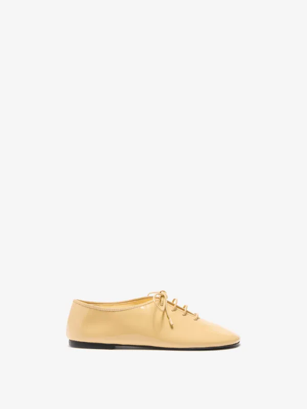 Glove Lace Up Flats in Soft Patent sold by Proenza Schouler