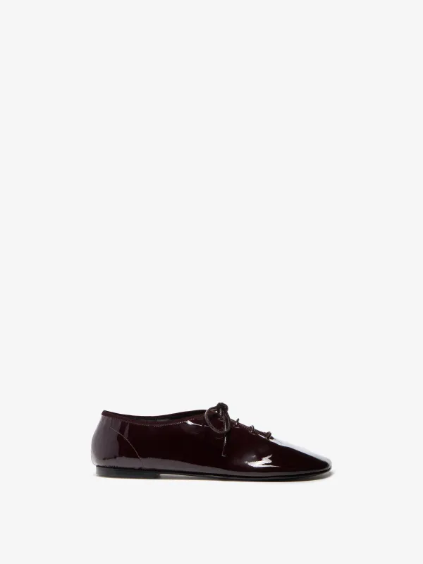 Glove Lace Up Flats in Soft Patent sold by Proenza Schouler