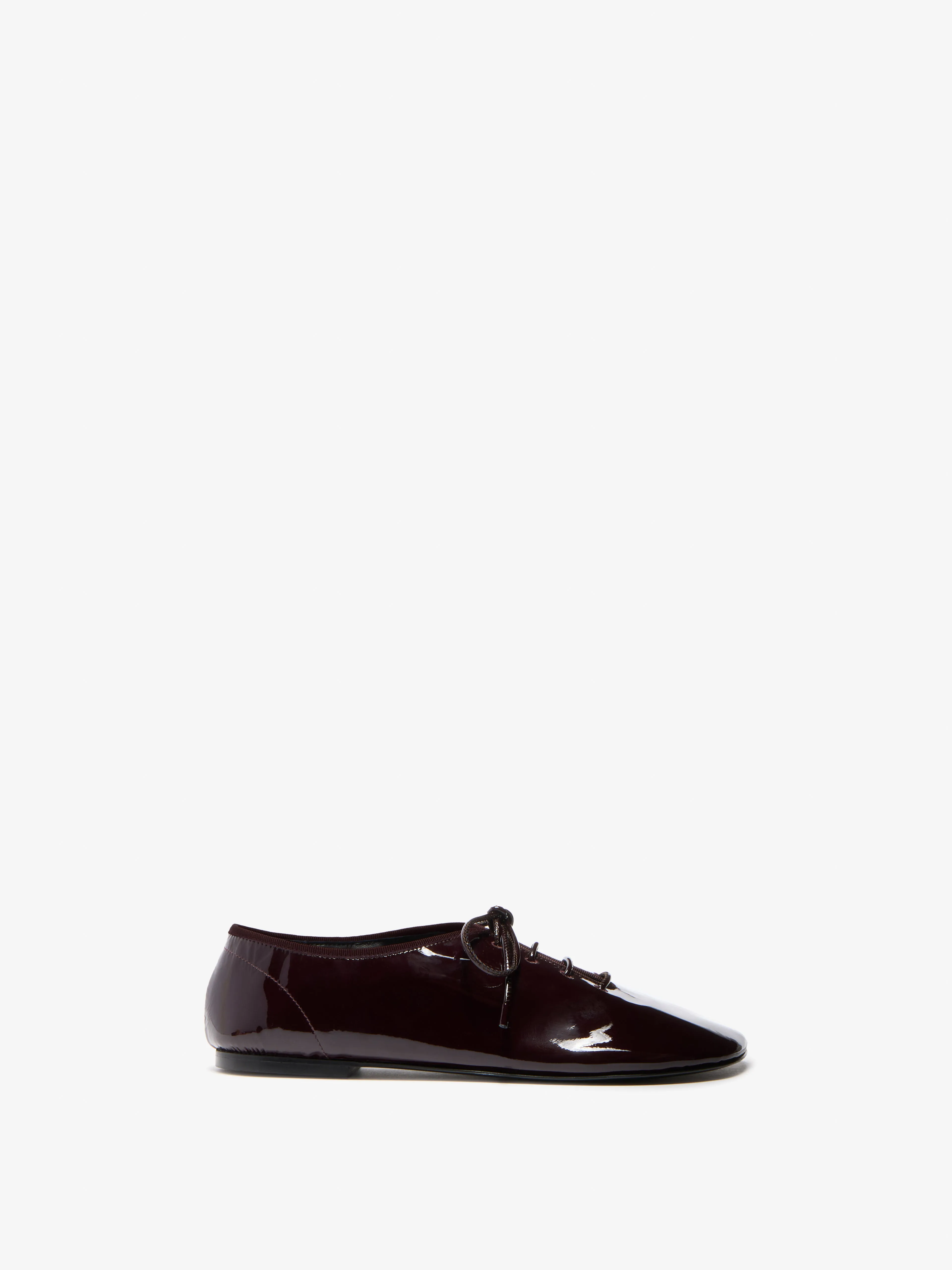 Glove Lace Up Flats in Soft Patent sold by Proenza Schouler