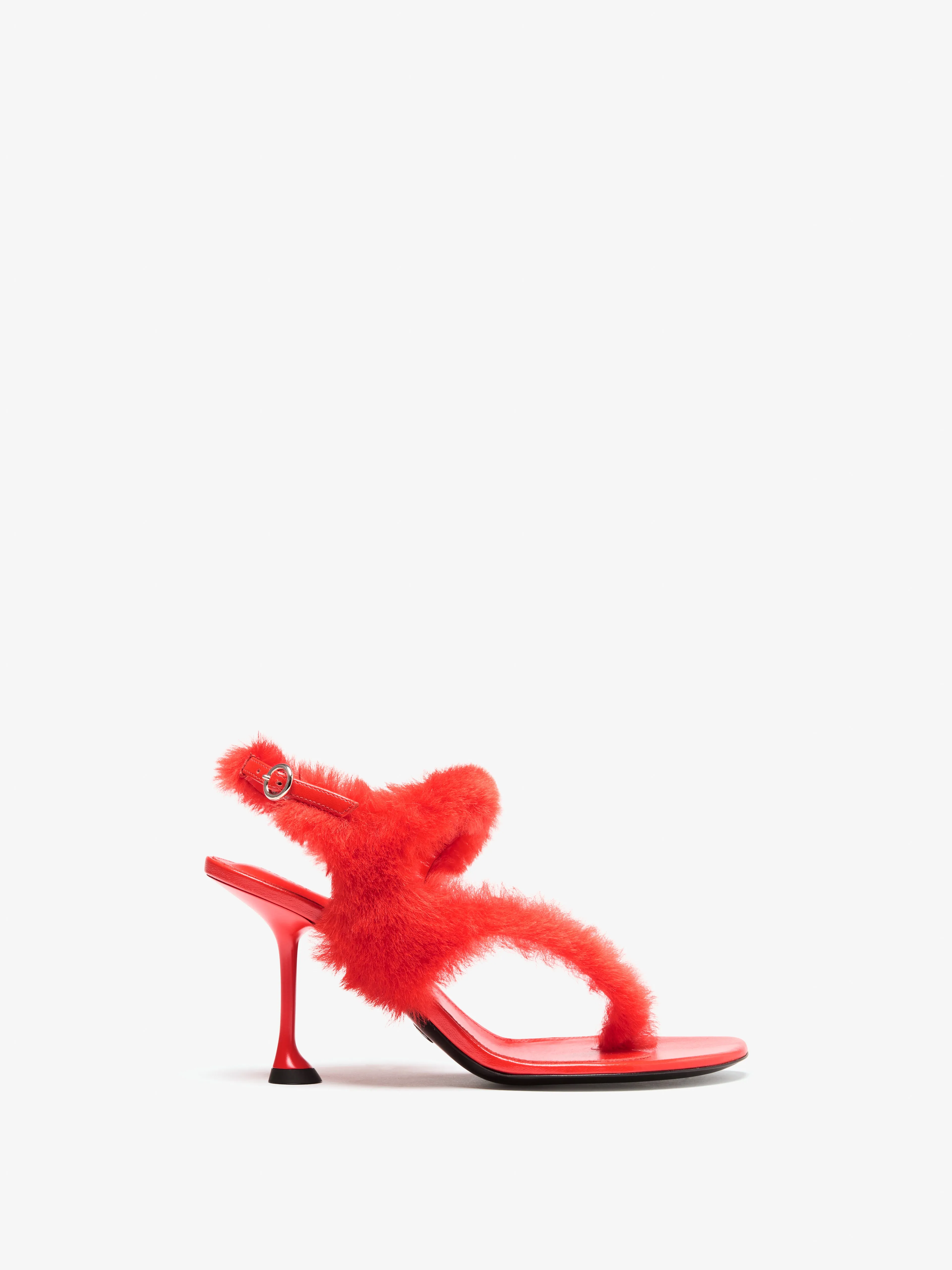 Tee Thong Sandals in Shearling sold by Proenza Schouler