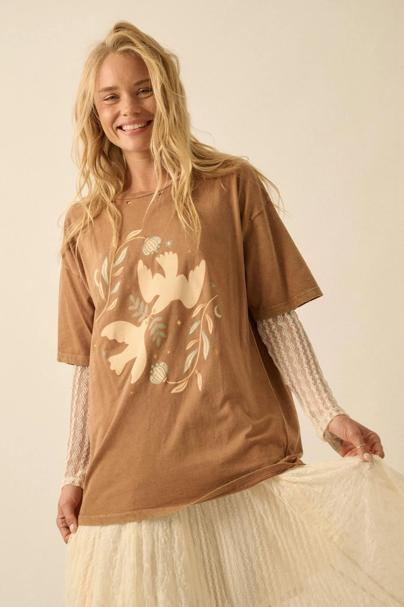 Wings of Peace Distressed Oversize Graphic Tee sold by Promesa