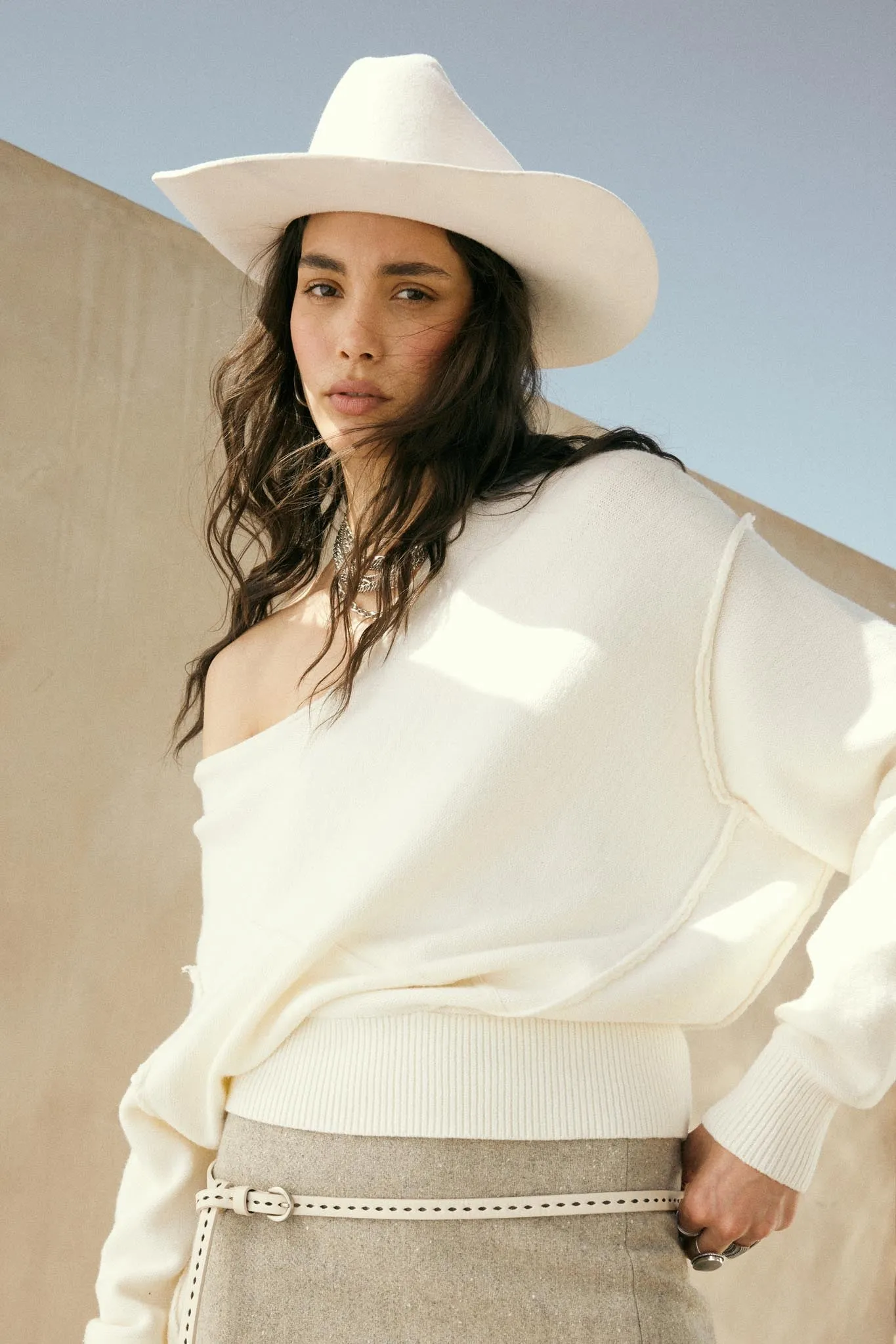 A Cute Angle Asymmetrical Exposed-Seam Sweater sold by Promesa
