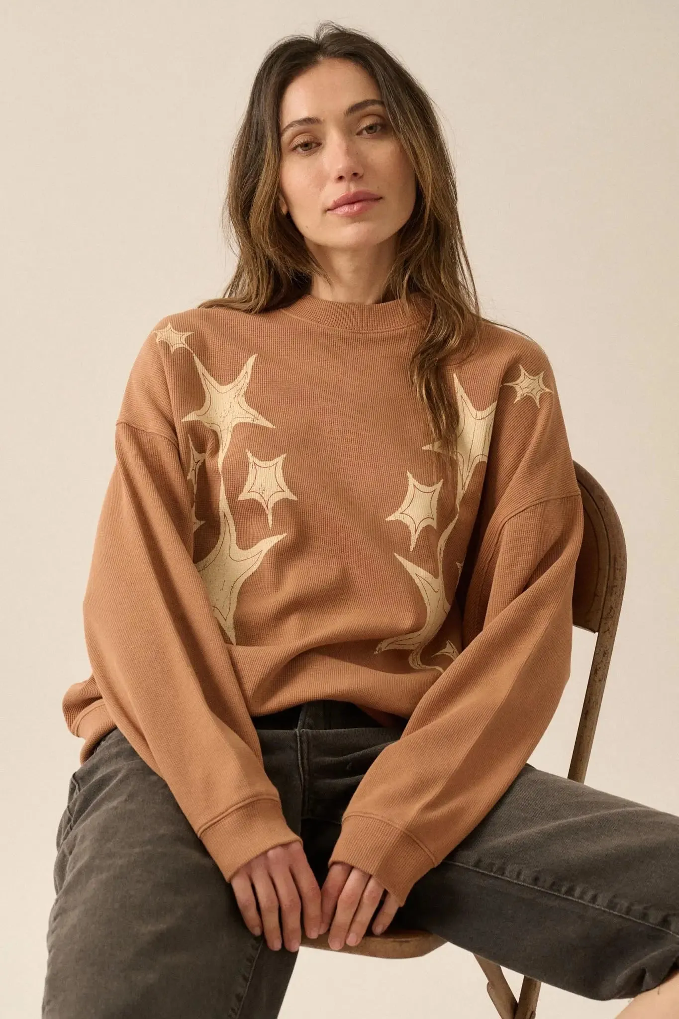 Stars Align Vintage-Print Thermal Graphic Top sold by Promesa