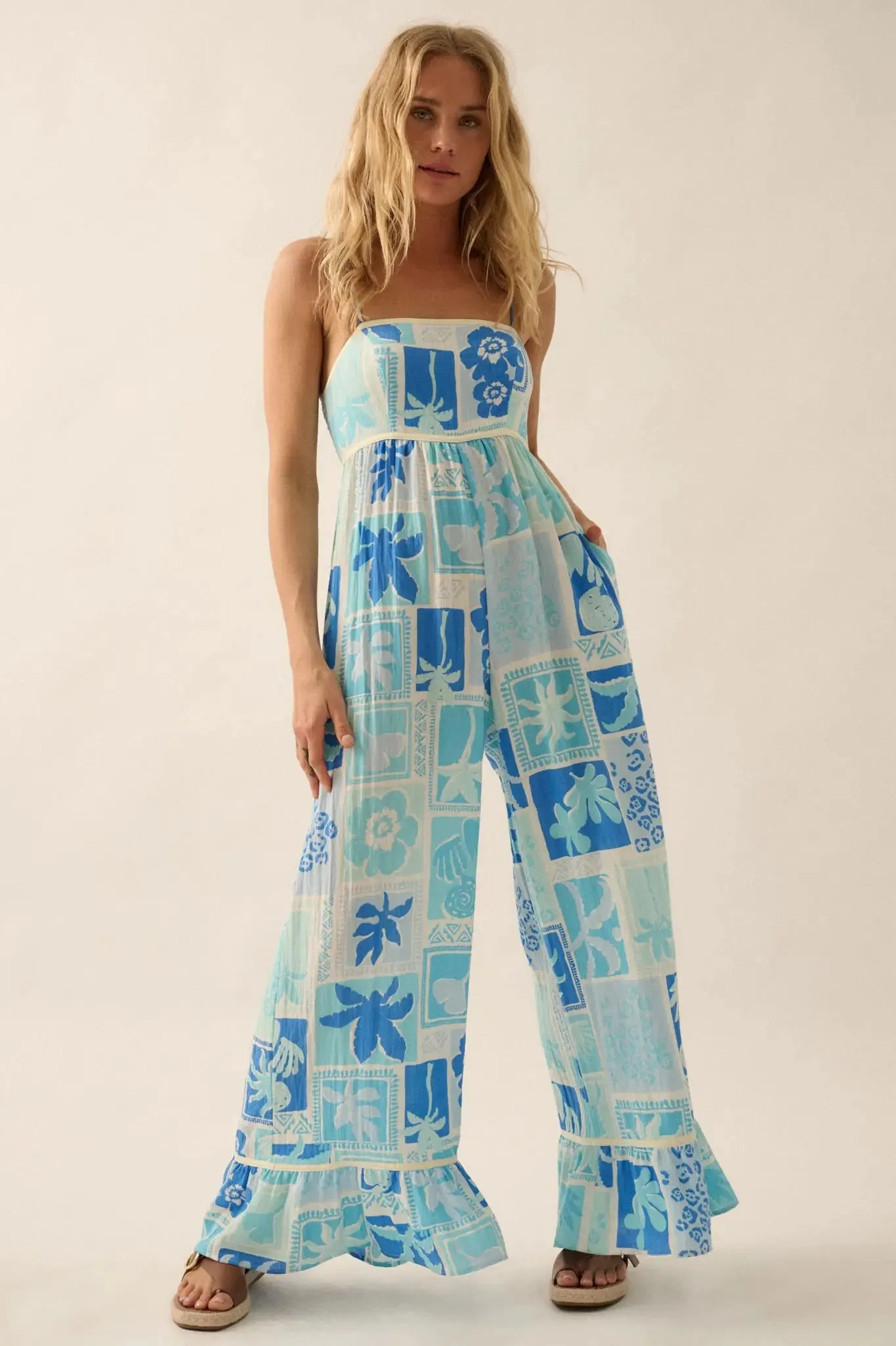 Escape Plan Tropical Floral Ruffle-Hem Jumpsuit sold by Promesa