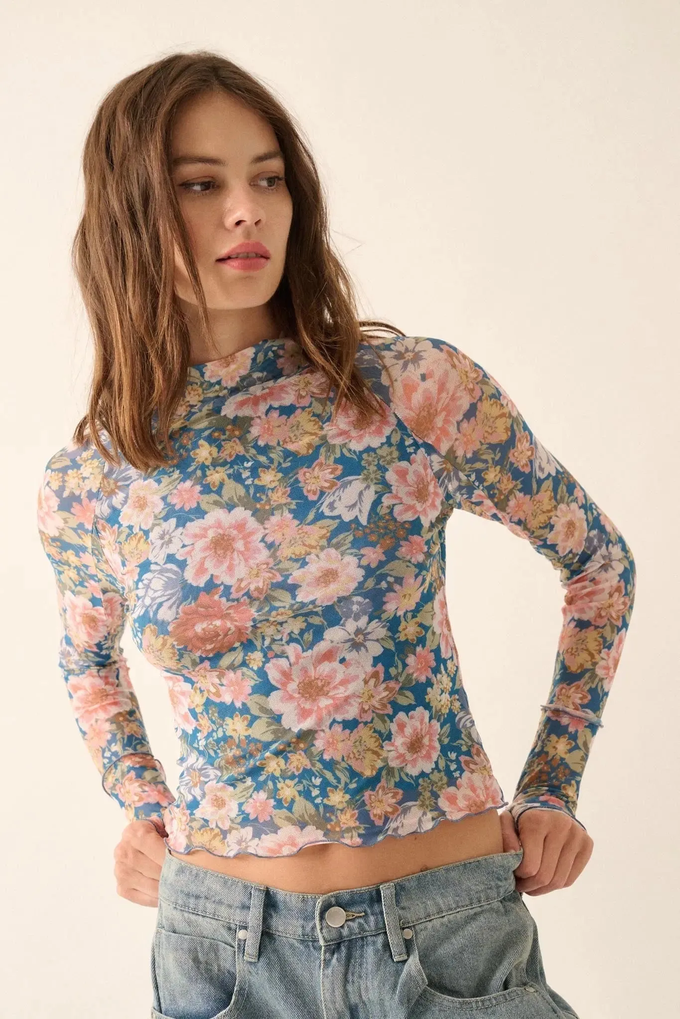 Wild Blooms Floral Mesh Mock-Neck Thumbhole Top sold by Promesa