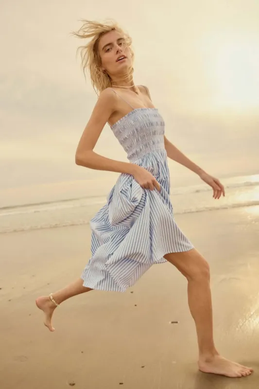 Stripe It Up Striped Smocked Pocket Midi Dress sold by Promesa