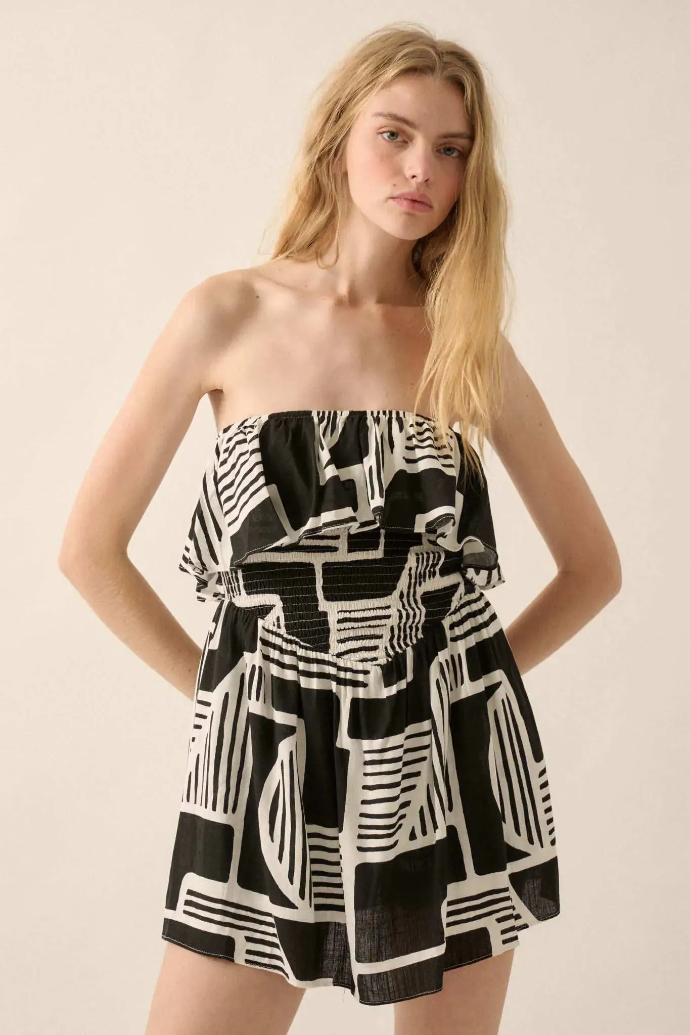 Shape of You Geo-Print Strapless Flounce Romper sold by Promesa