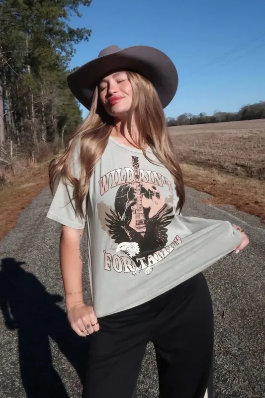 Wild Ain't For Tamin' Slashed Graphic Tee sold by Promesa