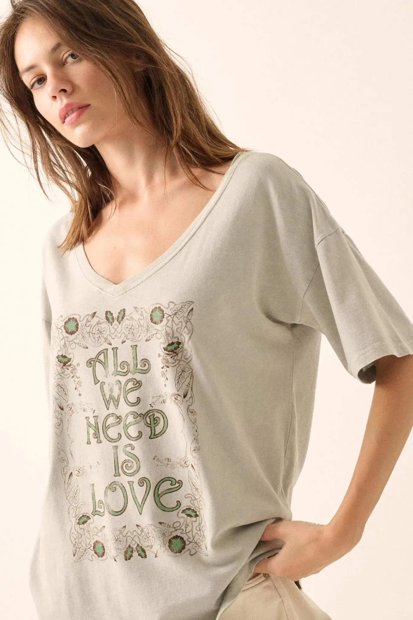 All We Need Is Love V-Neck Graphic Tee sold by Promesa